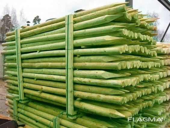 Rounded pine pillars, fences, palisades